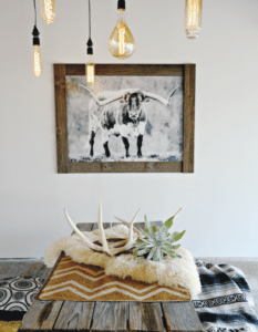 rustic dining room with longhorn