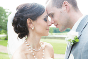 bride and groom forehead to forehead