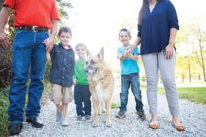 family with german shepherd