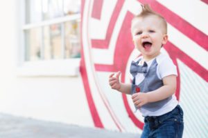 smiling toddler with bowtie