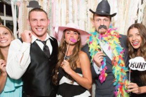 party guests with photo props