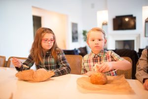 Kids eating potato soup