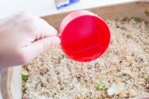 red measuring cup over rice