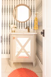 10 Beautiful Ideas for How To Use Wallpaper in Modern Home Design Schumacher black and white fern wallpaper round wood mirror grey bathroom vanity gold plimbing fixtures-1