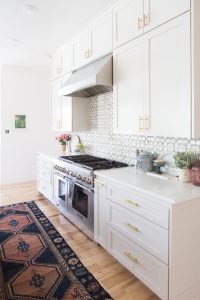 Affordable Ceramic Patterned Tile Backsplash affordable modern gold bar stools white kitchen with gold hardware design ideas patterned tile backsplash kitchen gold kitchen lantern lighting