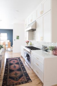 Affordable Ceramic Patterned Tile Backsplash affordable modern gold bar stools white kitchen with gold hardware design ideas patterned tile backsplash kitchen gold kitchen lantern lighting