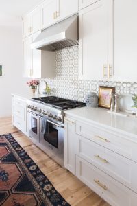 Affordable Ceramic Patterned Tile Backsplash affordable modern gold bar stools white kitchen with gold hardware design ideas patterned tile backsplash kitchen gold kitchen lantern lighting