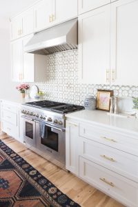 Affordable Ceramic Patterned Tile Backsplash affordable modern gold bar stools white kitchen with gold hardware design ideas patterned tile backsplash kitchen gold kitchen lantern lighting