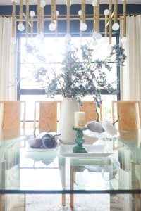 Loveliest Looks of Fall Home Tour Beautiful Fall Home Decor and Fall Fashion Ideas dining room fall tablescape with velvet pumpkins and a white large vase with faux green stems