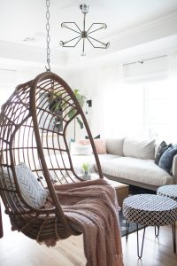 CC and Mike Teen Hangout Room Reveal with Joybird Sectional woven hanging chair in a room white white walls