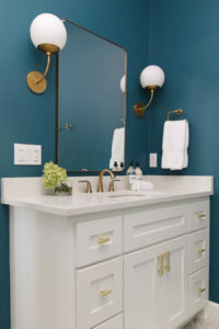 CC and Mike Frisco I Project Reveal teal Galapagos torquiest girls bedroom and bathroom design with black curtains and a black canopy bed and custom vogue womens art above the bed