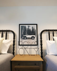 How to Decorate Boys Rooms on a Budget black Jenny Lind bed vintage Land Rover picture oak night stand wire boys only sign